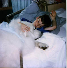 Adam and Great Pyrenees Kolya at UCLA Medical 